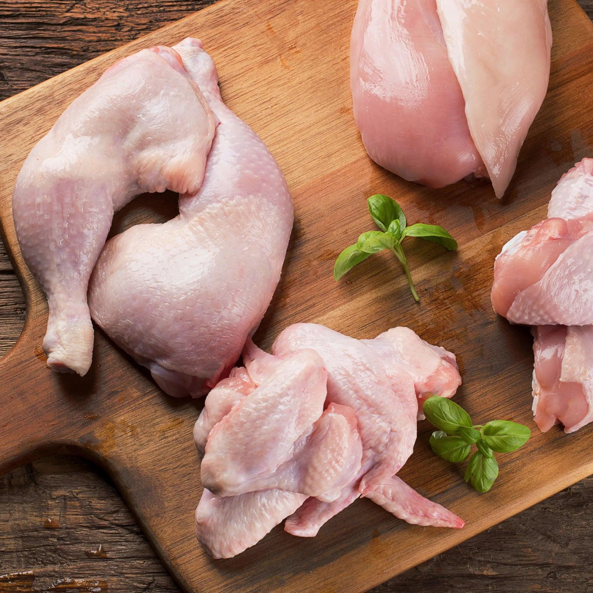 Fresh chicken with vegetables, lemon and herbs